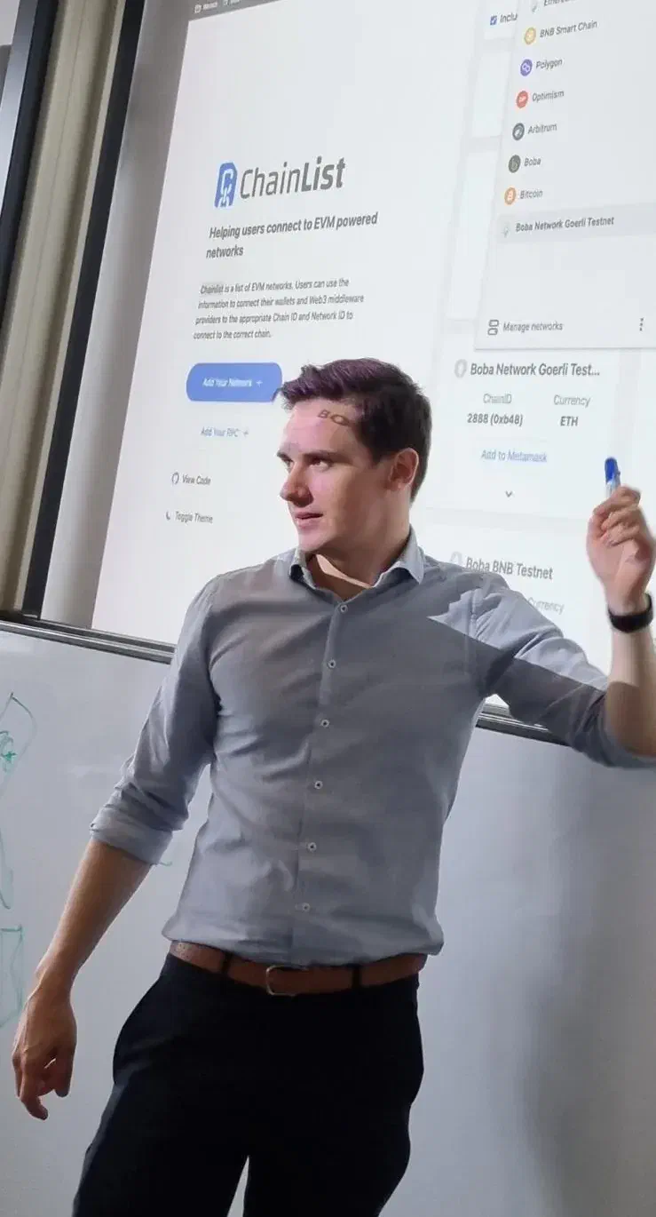 Christof Jori presenting a blockchain wallet interface during a workshop